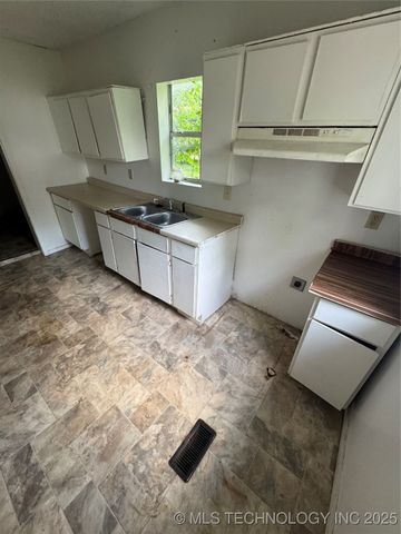 411 W 12th Street, Okmulgee, OK 74447