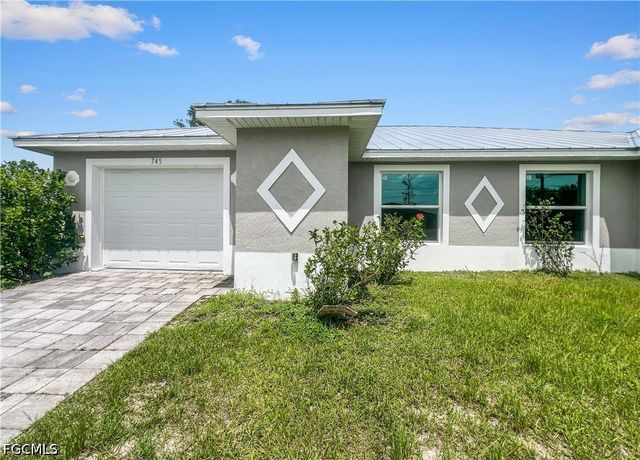 745 Harry AVE S, Lehigh Acres, FL 33973