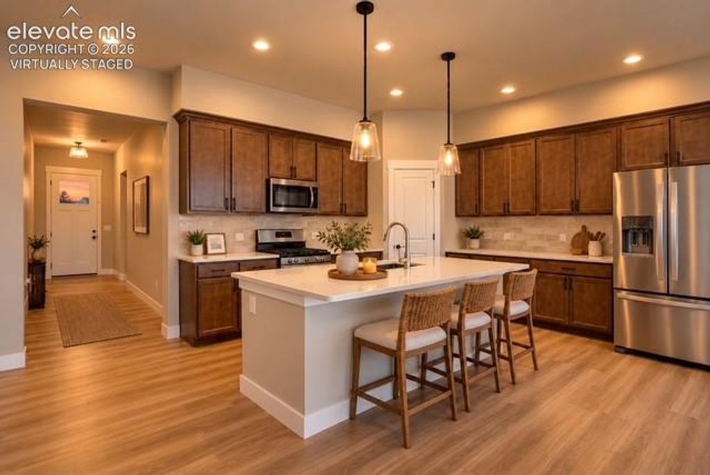 8318 Sam Bass Drive, Colorado Springs, CO 80908 — photo 4