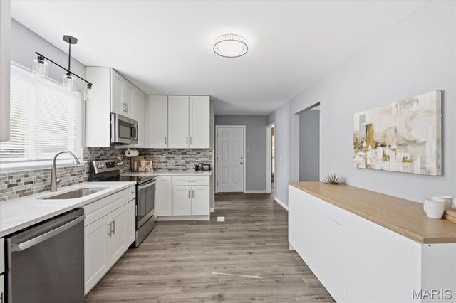 1718 Pheasant Run Drive, Maryland Heights, MO 63043