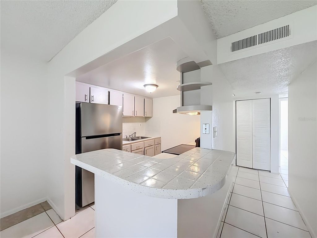 Image 5 of property listing at 1434 W HOLDEN AVENUE C-4, Orlando, FL 32839