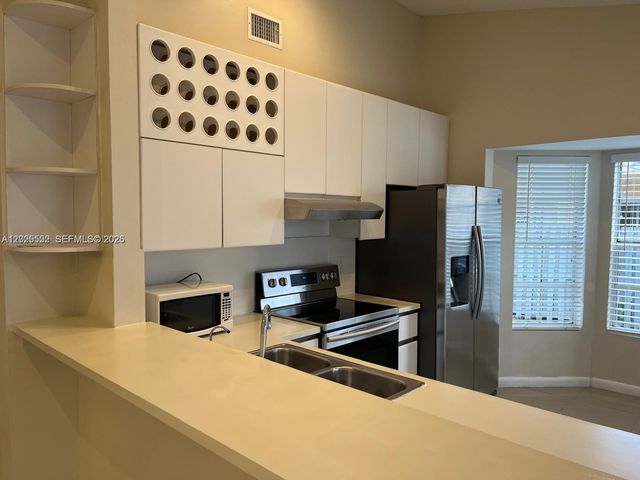 1294 Seagrape Cir, Weston, FL 33326