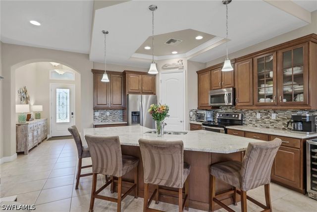 1589 Serrano CIR, Naples, FL 34105