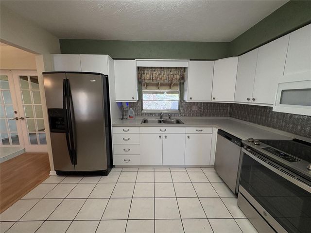 1008 LADY GUINEVERE DRIVE, Valrico, FL 33594