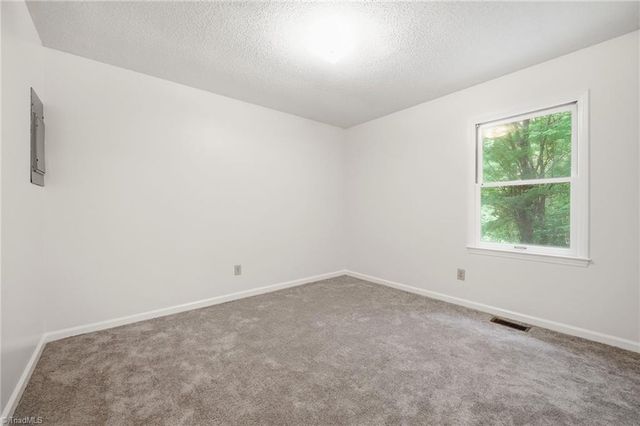 8474 Running Creek Road, Gibsonville, NC 27249