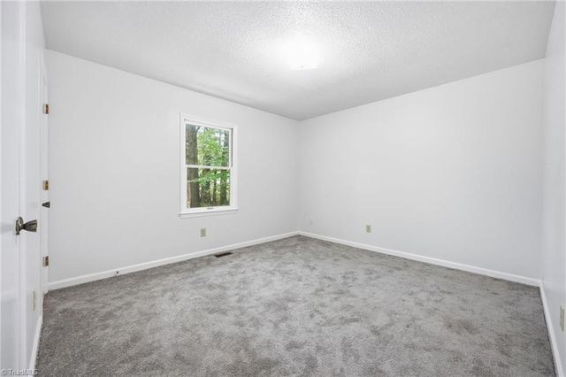 8474 Running Creek Road, Gibsonville, NC 27249