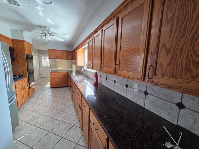 305 W Castle Harbour Drive, Friendswood, TX 77546