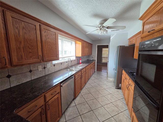 305 W Castle Harbour Drive, Friendswood, TX 77546