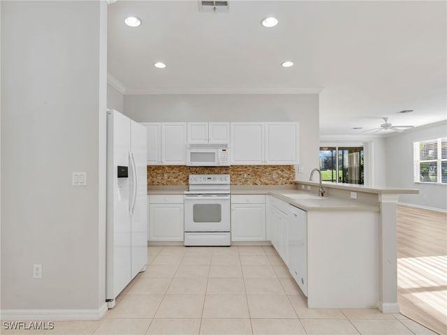 2305 Carnaby CT, Lehigh Acres, FL 33973