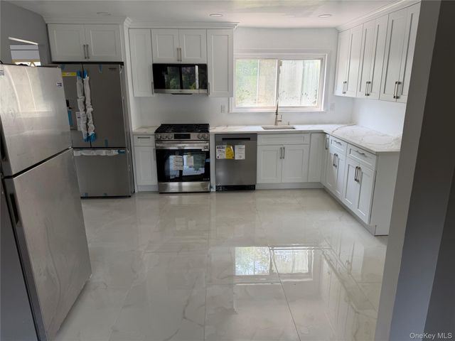 2 Valley Forge Drive, Wheatley Heights, NY 11798