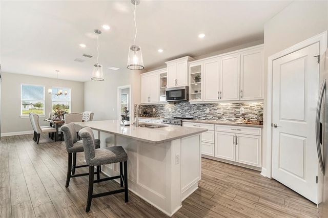 7122 HERON WALK LANE, Wesley Chapel, FL 33545