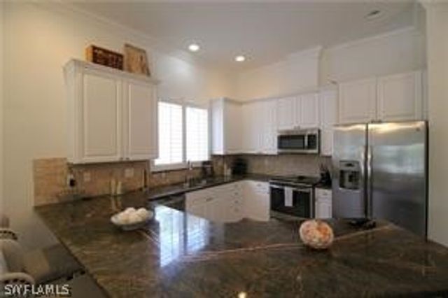 11002 W Vanderbilt DR, Naples, FL 34108