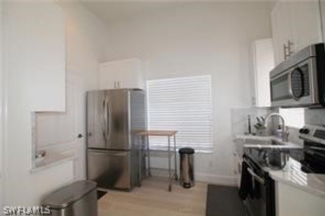 11002 W Vanderbilt DR, Naples, FL 34108