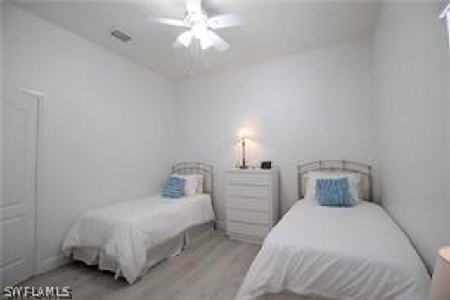 11002 W Vanderbilt DR, Naples, FL 34108