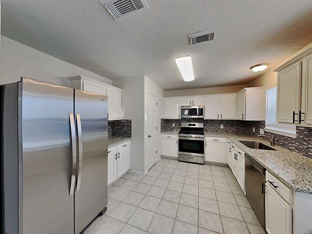 26881 Monarch Manor Lane, Kingwood, TX 77339