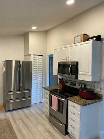 300 La Mancha Avenue, Royal Palm Beach, FL 33411
