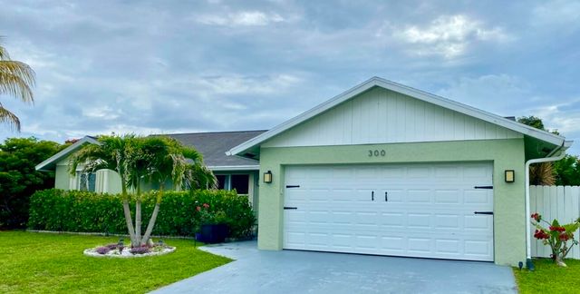 300 La Mancha Avenue, Royal Palm Beach, FL 33411