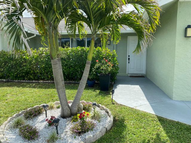 300 La Mancha Avenue, Royal Palm Beach, FL 33411