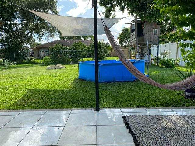 300 La Mancha Avenue, Royal Palm Beach, FL 33411