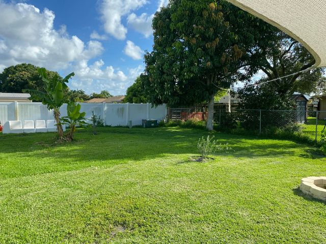 300 La Mancha Avenue, Royal Palm Beach, FL 33411