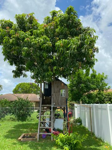 300 La Mancha Avenue, Royal Palm Beach, FL 33411