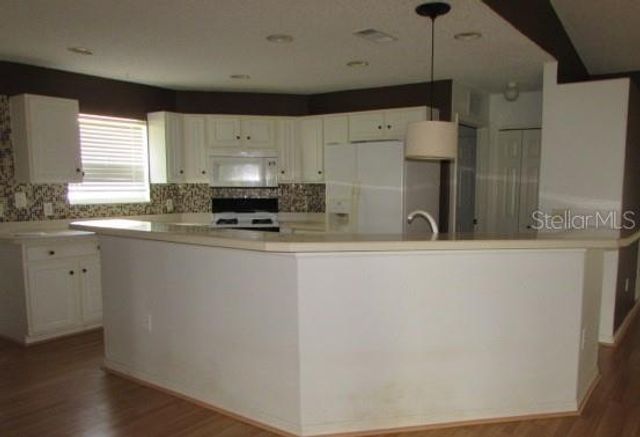 1142 MEADOWBEND DRIVE, Leesburg, FL 34748