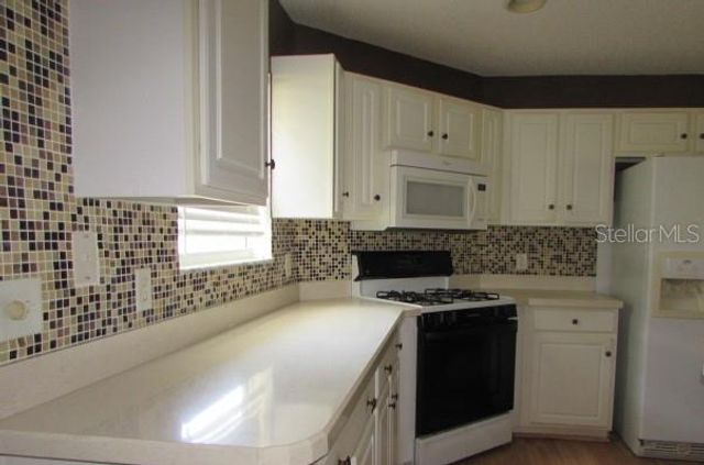 1142 MEADOWBEND DRIVE, Leesburg, FL 34748