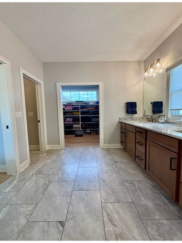 5077 Oak Ridge Court, Bettendorf, IA 52722