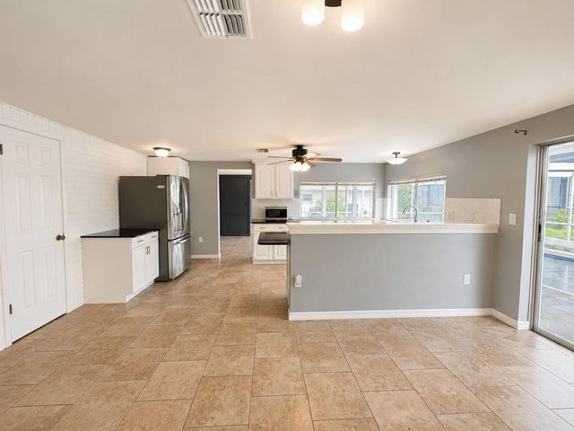 12407 WEATHERSTONE ROW, Hudson, FL 34667