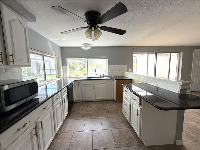 12407 WEATHERSTONE ROW, Hudson, FL 34667