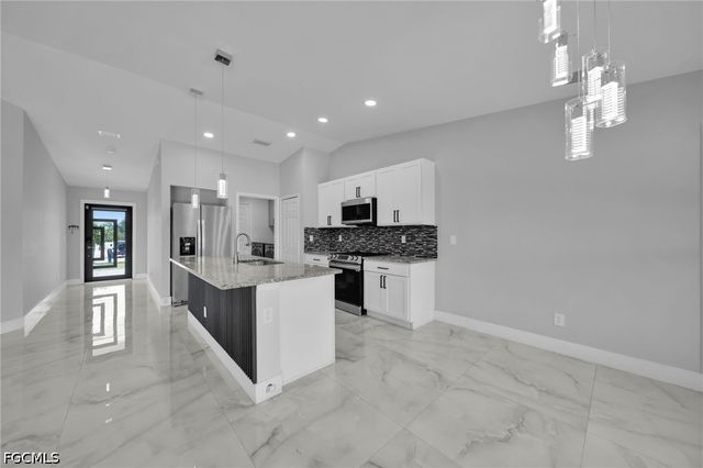 3095 NW 4th PL, Cape Coral, FL 33993