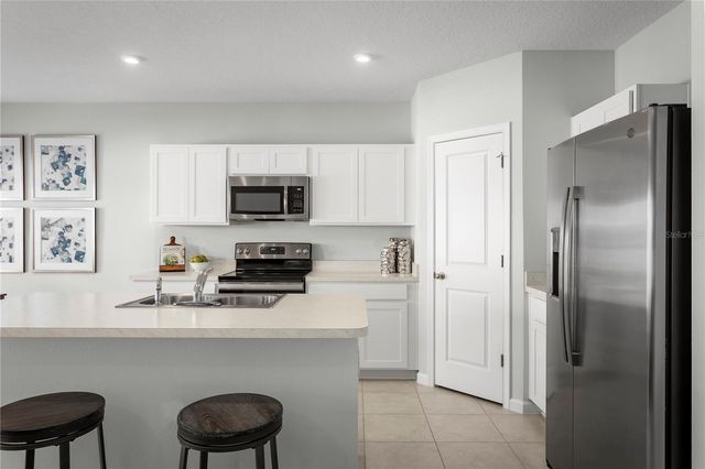 8884 WILDFLOWER FIELD LANE, Wildwood, FL 34785