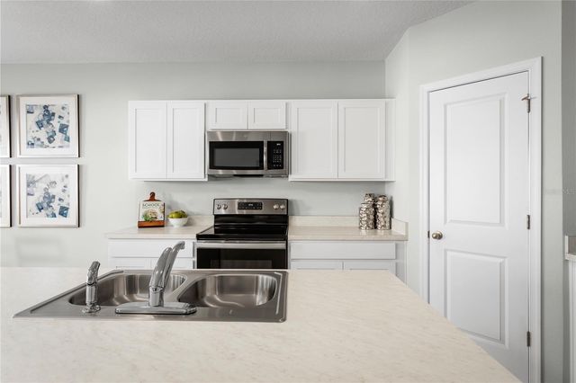8884 WILDFLOWER FIELD LANE, Wildwood, FL 34785