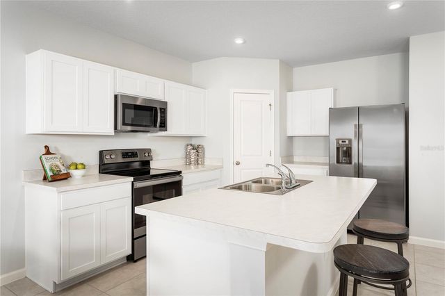 8884 WILDFLOWER FIELD LANE, Wildwood, FL 34785