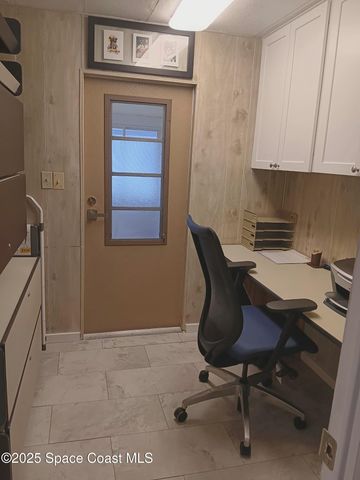 621 Hyacinth Circle E, Barefoot Bay, FL 32976