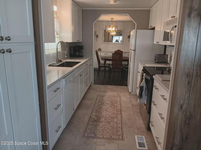 621 Hyacinth Circle E, Barefoot Bay, FL 32976