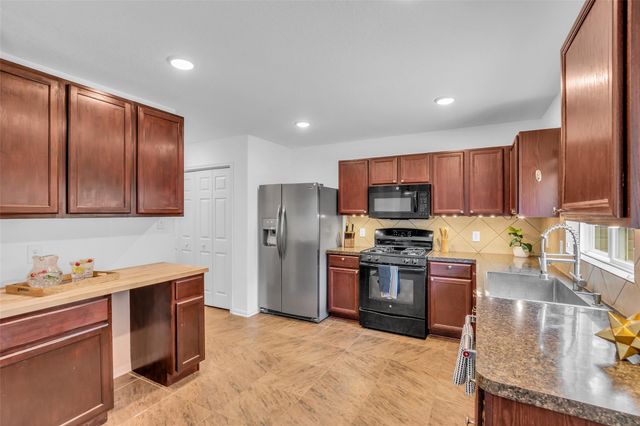 16718 Warbler Drive, Conroe, TX 77385