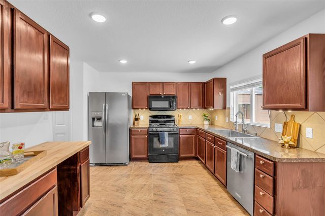 16718 Warbler Drive, Conroe, TX 77385