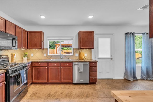 16718 Warbler Drive, Conroe, TX 77385