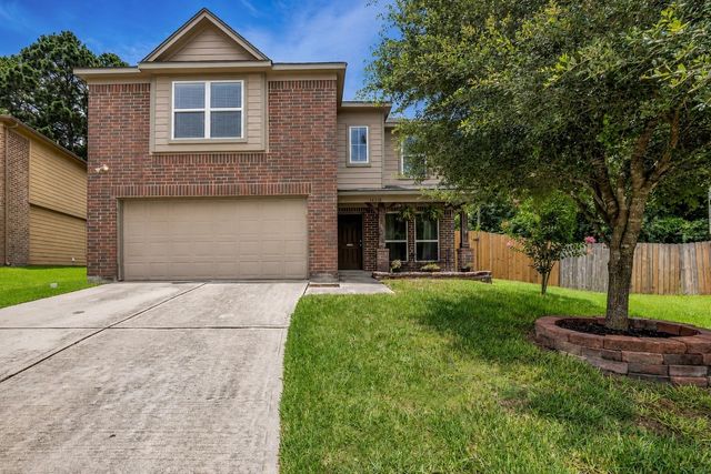16718 Warbler Drive, Conroe, TX 77385
