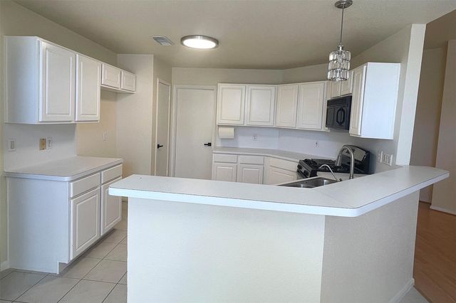 9502 Coast Bridge Street, Houston, TX 77075