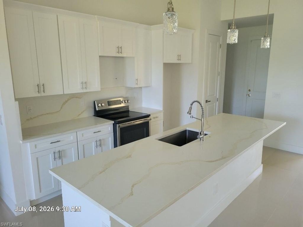 2128 NE 40th ST, CAPE CORAL, FL 33909 — photo 2