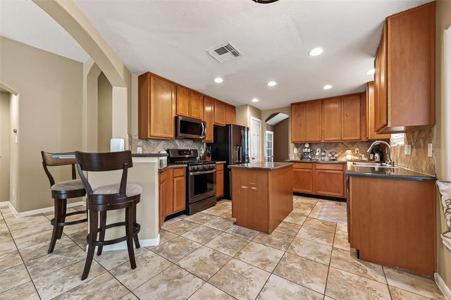 15827 Parmley Creek Court, Cypress, TX 77429