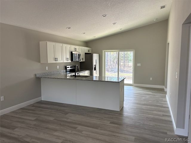 6604 N Roland Drive, Dunnellon, FL 34433