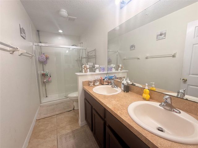 307 PRICKLE PEAR COURT 64, Orlando, FL 32824