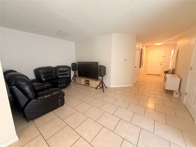 307 PRICKLE PEAR COURT 64, Orlando, FL 32824
