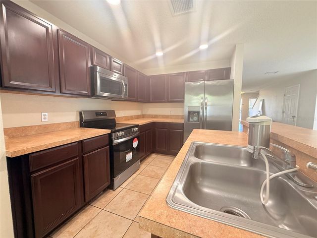 307 PRICKLE PEAR COURT 64, Orlando, FL 32824