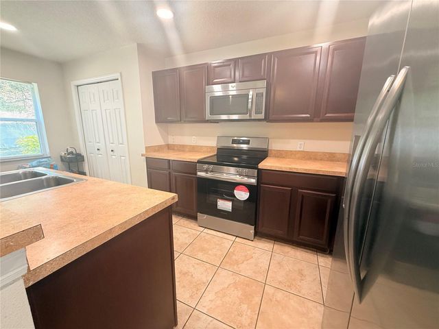 307 PRICKLE PEAR COURT 64, Orlando, FL 32824