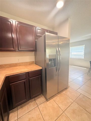 307 PRICKLE PEAR COURT 64, Orlando, FL 32824