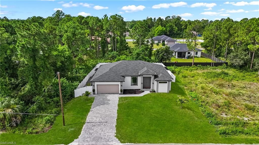 2711 18th ST W, LEHIGH ACRES, FL 33971 — exterior